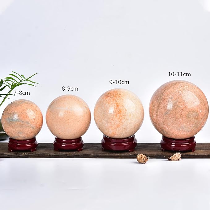 JIC Gem Natural Sunstone Sphere Ball with Wooden Stand for Fengshui Rare Healing Crystal Ball Decoation Meditation Energy Reiki Ball (90-100mm)